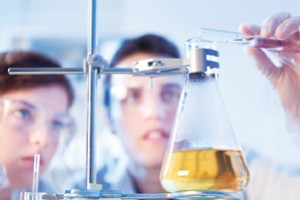 Two students working on lab experiment